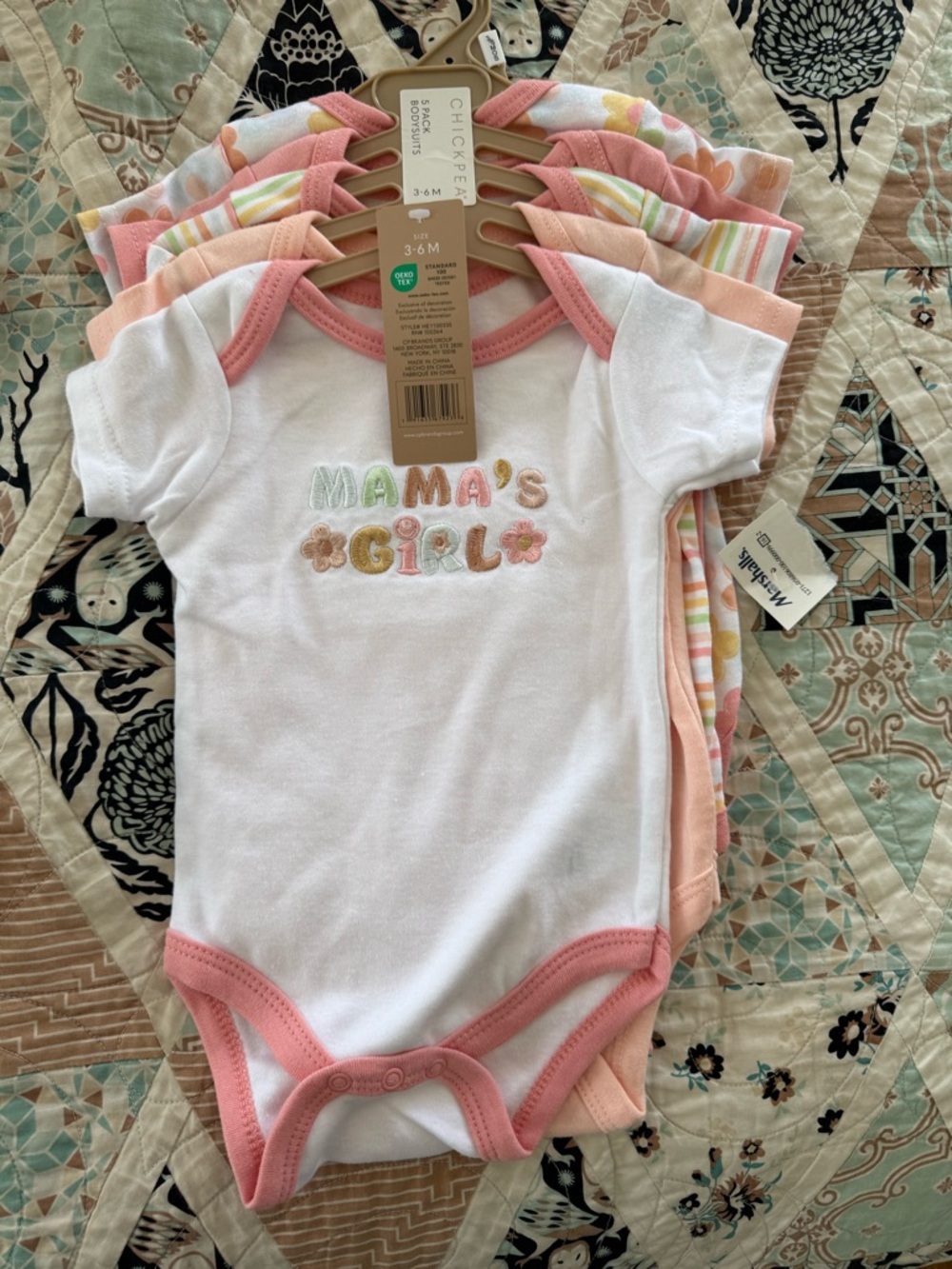 Lot of baby girl onesies and footie PJs